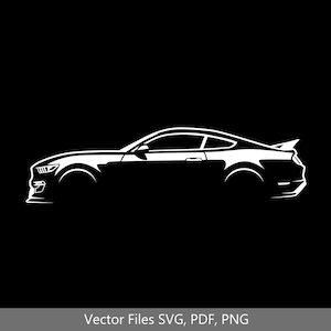 以下が含まれることがあります： 黒の背景に、スポイラー付きのスポーツカーの白いシルエット。車は右向きです。