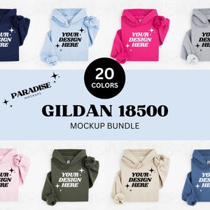 Puede incluir: Un paquete de maquetas de 20 sudaderas con capucha Gildan 18500 de diferentes colores. Las sudaderas con capucha están colocadas en plano y presentan el texto "YOUR DESIGN HERE" impreso en la parte delantera.