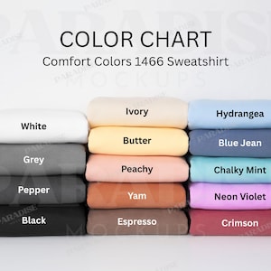 May include: A color chart for Comfort Colors 1466 sweatshirts featuring fifteen folded fabric swatches in various shades including white, grey, pepper, black, ivory, butter, peachy, yam, espresso, hydrangea, blue jean, chalky mint, neon violet, and crimson.