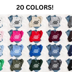 May include: A display of 20 different colored sweatshirts, each paired with denim. The sweatshirts have a puff sleeve design and the text "YOUR DESIGN + HERE". The image also has the text "20 COLORS!"