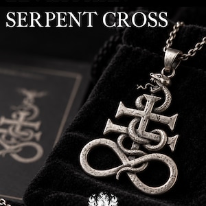May include: A silver-toned metal pendant featuring a Leviathan cross symbol entwined with a serpent, suspended from a chain. The text LEVIATHAN SERPENT CROSS is visible at the top, with a small skull emblem at the bottom of the image.