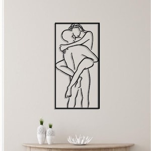 Minimalistische metalen muurkunst koppel: modern interieur