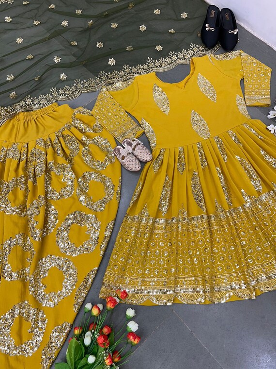 Buy Yellow Crepe Band Printed Kurta Dhoti Pant Set For Women by Nikasha  Online at Aza Fashions.