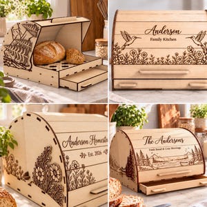 May include: A light-coloured wooden bread box with a roll-top lid and a pull-out drawer. The exterior features laser-engraved designs including hummingbirds, floral patterns, mountain landscapes, and custom text such as Anderson Family Kitchen.