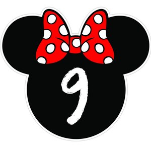 May include: A black Mickey Mouse head shape with a red bow featuring white polka dots. The number 9 is written in white script inside the head shape. The design is outlined in white.