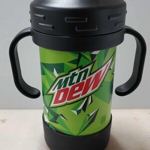 May include: Green and red Mountain Dew branded stainless steel sippy cup with black handles and a clear lid.