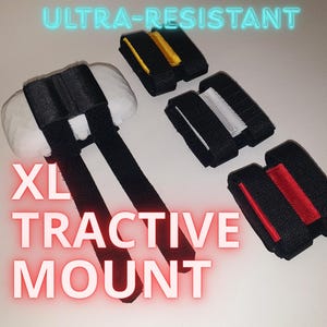 May include: An assortment of black straps with colored accents, including yellow, white, and red. The text "ULTRA-RESISTANT" and "XL TRACTIVE MOUNT" are displayed in neon-style lettering. The straps appear to be made of durable material.