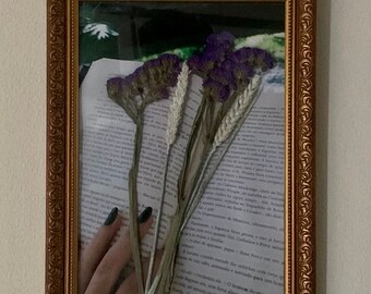 flower girl reading a book picture with real dried flower art on top in baroque picture frame