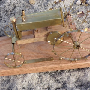John Deere AW wood and brass model tractor