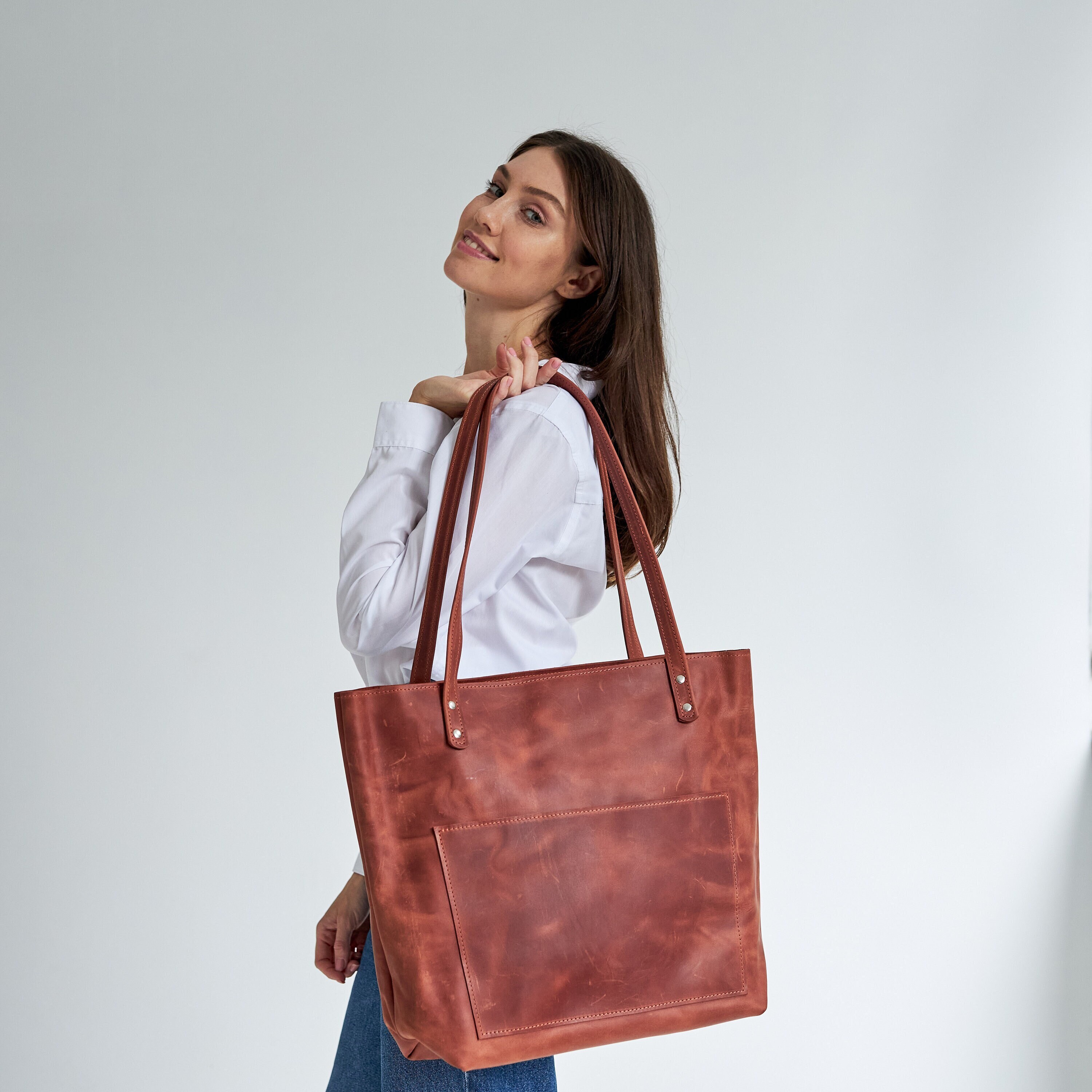 Handbags with exterior pockets hotsell
