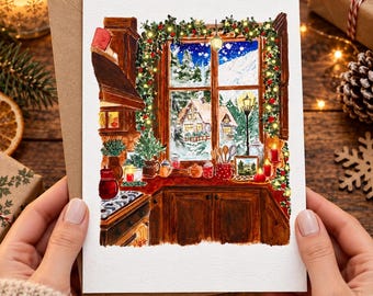 May include: A greeting card featuring a watercolor illustration of a cozy kitchen interior during winter. The scene shows a window looking out onto a snowy landscape with a house, framed by a garland with lights, red berries, and greenery.