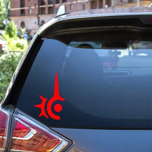 May include: A red car with a red Final Fantasy VII sticker on the back window.