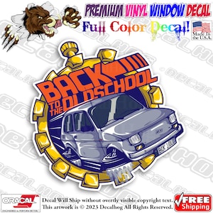 May include: A yellow and orange clock with the words "Back to the Old School" and a cartoon illustration of a blue car. The car has a number plate that reads "BCK 2 OLD".