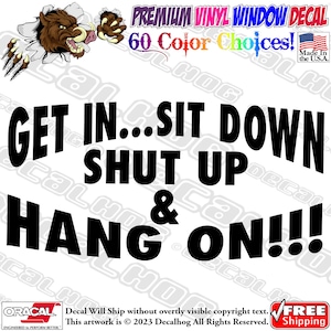 May include: Black and white vinyl decal with the text "GET IN...SIT DOWN SHUT UP & HANG ON!!!"  The decal features a cartoon wolf breaking through a wall.