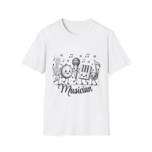 May include: A white short-sleeved t-shirt featuring a black and white graphic of anthropomorphic musical instruments including a treble clef, tambourine, microphone, piano, and music note, with the word Musician printed in a cursive script.