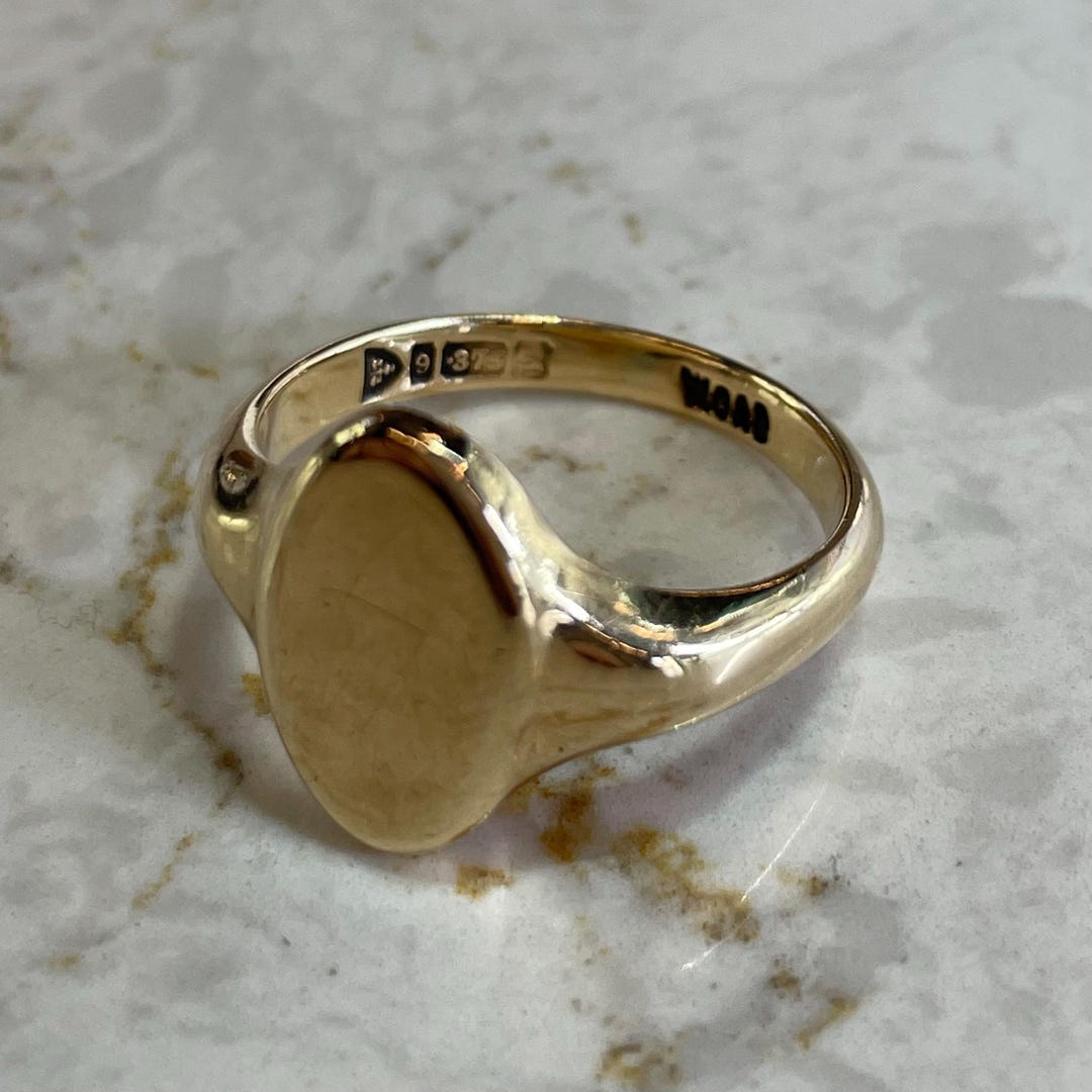 Platinum 11 x 9mm Oval Signet Ring main image 0