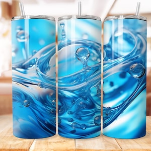 May include: Three stainless steel tumblers with a blue water splash design. The tumblers have a clear lid and a straw.
