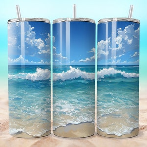 May include: Three stainless steel tumblers with a beach scene design. The design features a blue sky with white clouds, blue ocean waves, and white sand.