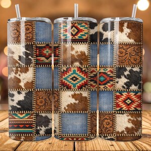 May include: Three stainless steel tumblers with lids and straws. The tumblers feature a patchwork design with denim, cowhide, and Southwestern patterns in brown, blue, and red. The design is reminiscent of a Western theme.