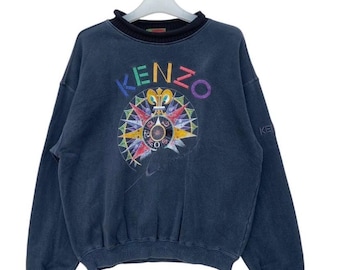 Sudadera vintage Kenzo Sun Faded: ropa urbana de cuello redondo con estampado gráfico de diseñador