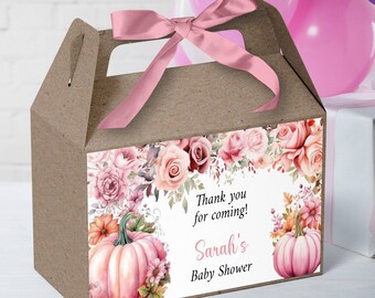 May include: A brown favor box with a pink ribbon and a floral design. The box has a label that says "Thank you for coming! Sarah's Baby Shower".