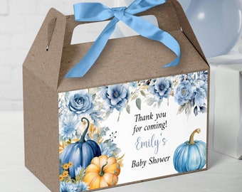 May include: Blue and yellow floral design favor box with a blue ribbon. The box has a thank you message that says "Thank you for coming! Emily's Baby Shower".