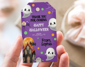 May include: Purple and green Halloween favor tag with a haunted house, a moon, bats, and ghosts. The text reads "Thank you for coming Happy Halloween From, Sophia".