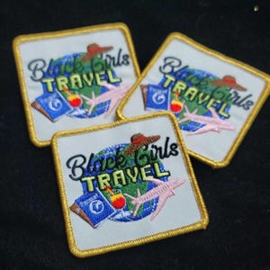 May include: A set of three ceramic mugs with a speckled, matte finish. Each mug features a different color: light blue, cream, and gray. The mugs have a simple, modern design and a comfortable handle.