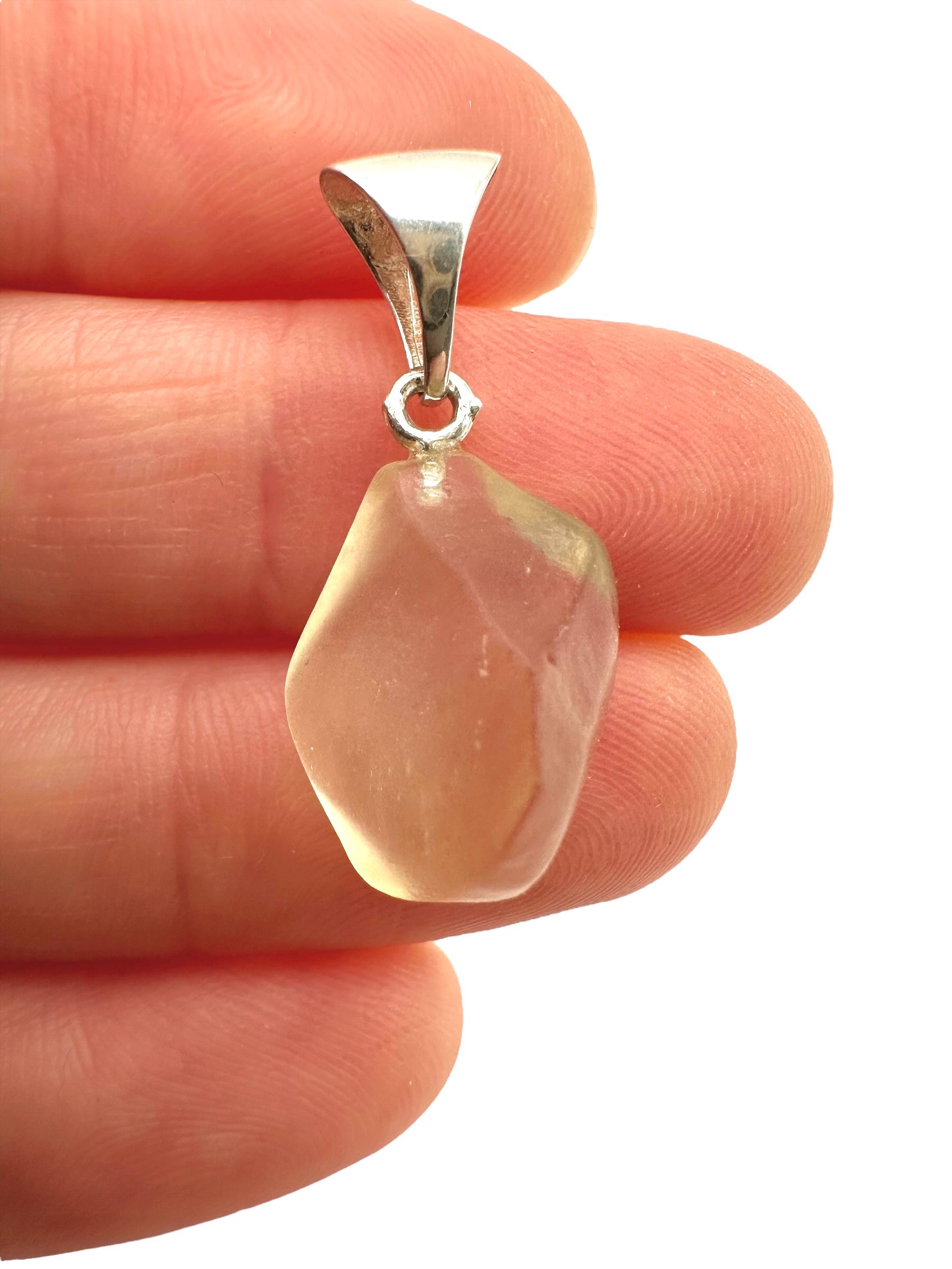 Silver pendant made of Libyan desert glass