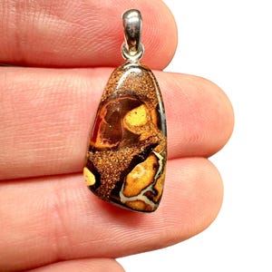 Silver pendant from Australian boulder opal