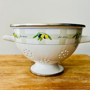 White enameled metal colander