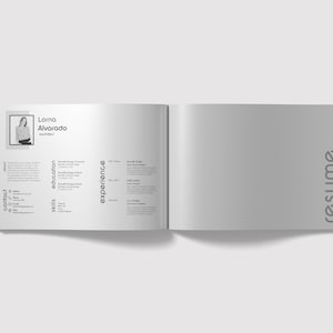 May include: A black and white resume with the name Lorna Alvarado at the top. The resume includes sections for contact, education, skills, and experience.