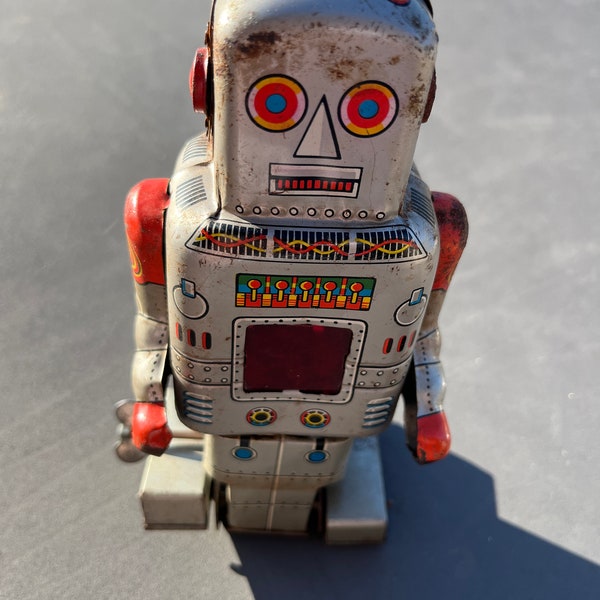 Japan Wind-up Robot with Spark Tin Toy (1960s)
