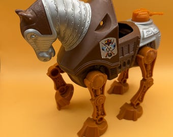 Masters of the Universe Stridor armored war horse action figure, originally released by Mattel in 1983. 
