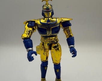Vintage Beetleborg Metallix Punching 6" Action Figure - Chromium Gold and Blue Bandai 1997