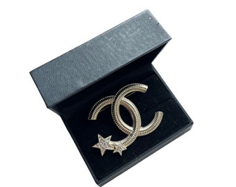 Chanel CC goudkleurige kristallen broche