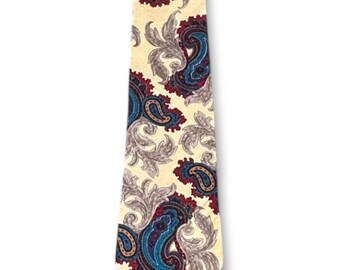 Corbata vintage de seda amarilla con estampado paisley de la colección de alta costura de Oscar de la Renta.