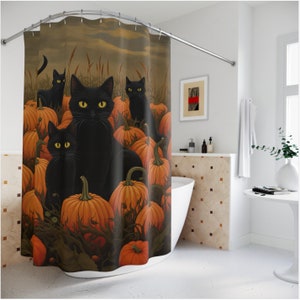 May include: A black shower curtain with a Halloween theme featuring black cats and orange pumpkins. The cats are sitting in a field of pumpkins.