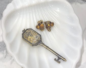 Vintage milk glass shell-shaped ashtray in Opalescent white milk glass. sought after by collectors as trinket jewelry keys catchall