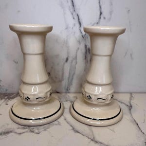 Pair of vintage 1996 Longaberger Woven Traditions Heritage Green pottery candlestick holders. 5 inches tall.
