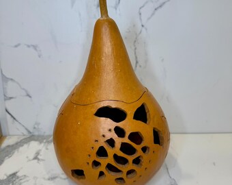 Handcrafted carved gourd with turtle and two lizard silhouettes & shell design. Signed/marked on bottom. Large gourd with unique character