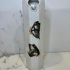 Vintage 1996 Bier art pottery speckled octagon vase with beautiful unique cut opening with hand etched butterfly motif. Artist signed.