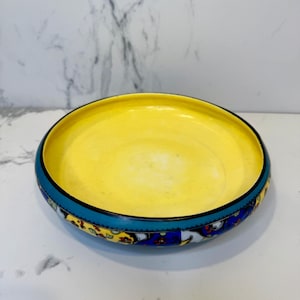 Vintage Czechoslovakian ceramic catch all or Vide Poche with gorgeous abstract exterior design in primary colors with solid yellow interior.