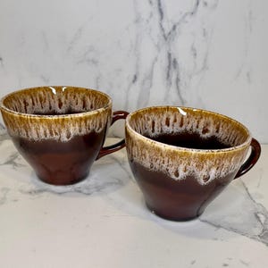 Set of 2 beautiful vintage drip glaze petite/smaller cups in incredible rich warm browns and creams. The glaze on these is gorgeous.