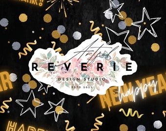 May include: A black background with gold and silver confetti, stars, and ribbons. The text "Happy New Year!" is in neon yellow. The text "Artful Reverie Design Studio Est. 2023" is in white.