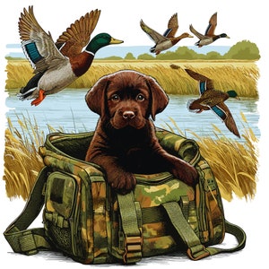 May include: A chocolate Labrador puppy sits inside a camouflage patterned tactical bag. The background features a detailed illustration of a river landscape with tall golden reeds and several mallard ducks flying through the air above the water.