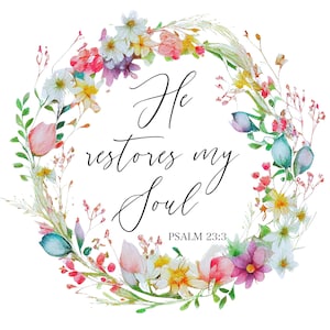 May include: A watercolor floral wreath with the text "He restores my soul" in elegant script. The wreath features a variety of flowers in shades of pink, yellow, white, and purple, with green foliage. Psalm 23:3 is written below.