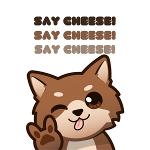 May include: A brown cartoon dog with a white muzzle and chest, winking and making a peace sign with its paw. The dog has its tongue sticking out. Above the dog, the text SAY CHEESE! is repeated three times in descending shades of brown.