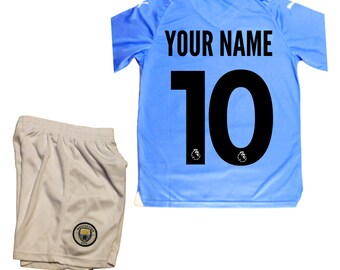 Manchester City Kinder Home Fußballtrikot 2023 | Passen Sie Ihren Namen und Ihre Nummer an