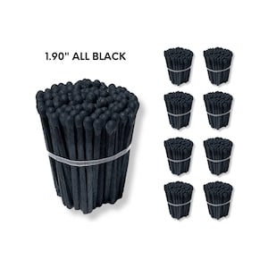 May include: A bundle of 1.90" all-black matches, tightly bound with a clear band. The image also shows six smaller bundles of the same matches. The matches are a solid black color.